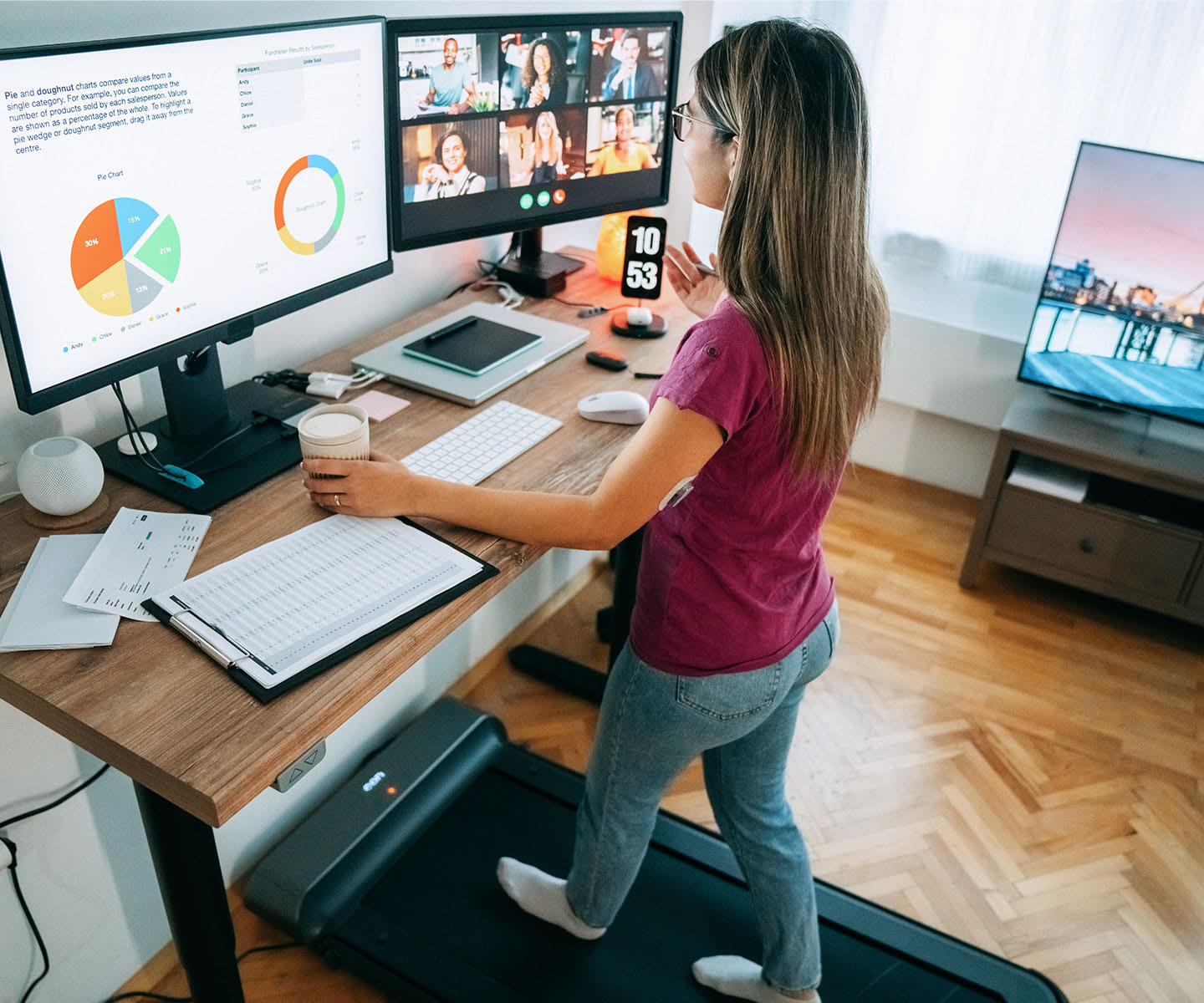 woman working at standing desk in her home