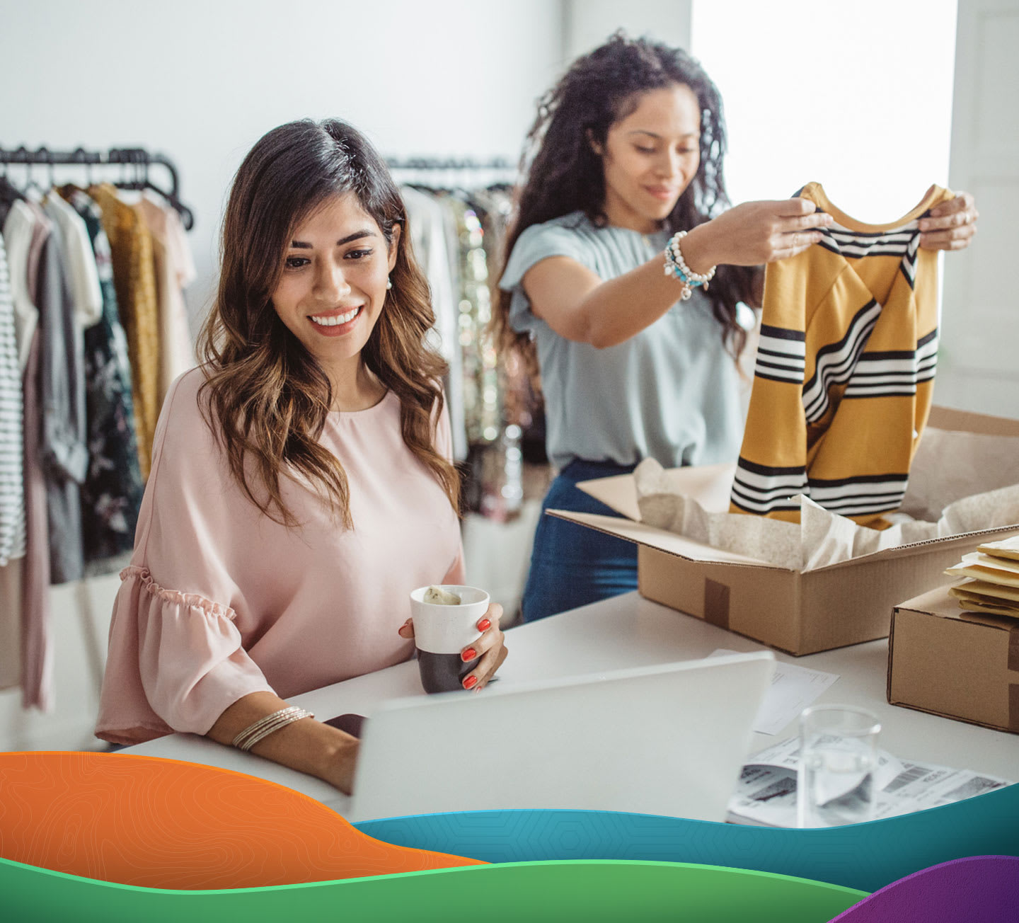 two small business owners working in retail