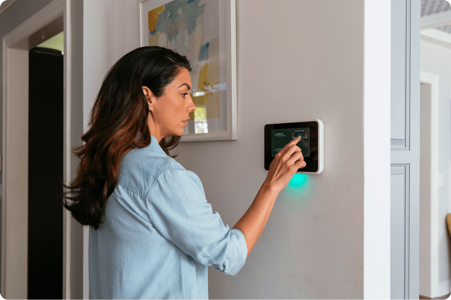 Woman checking her Viving smart hub