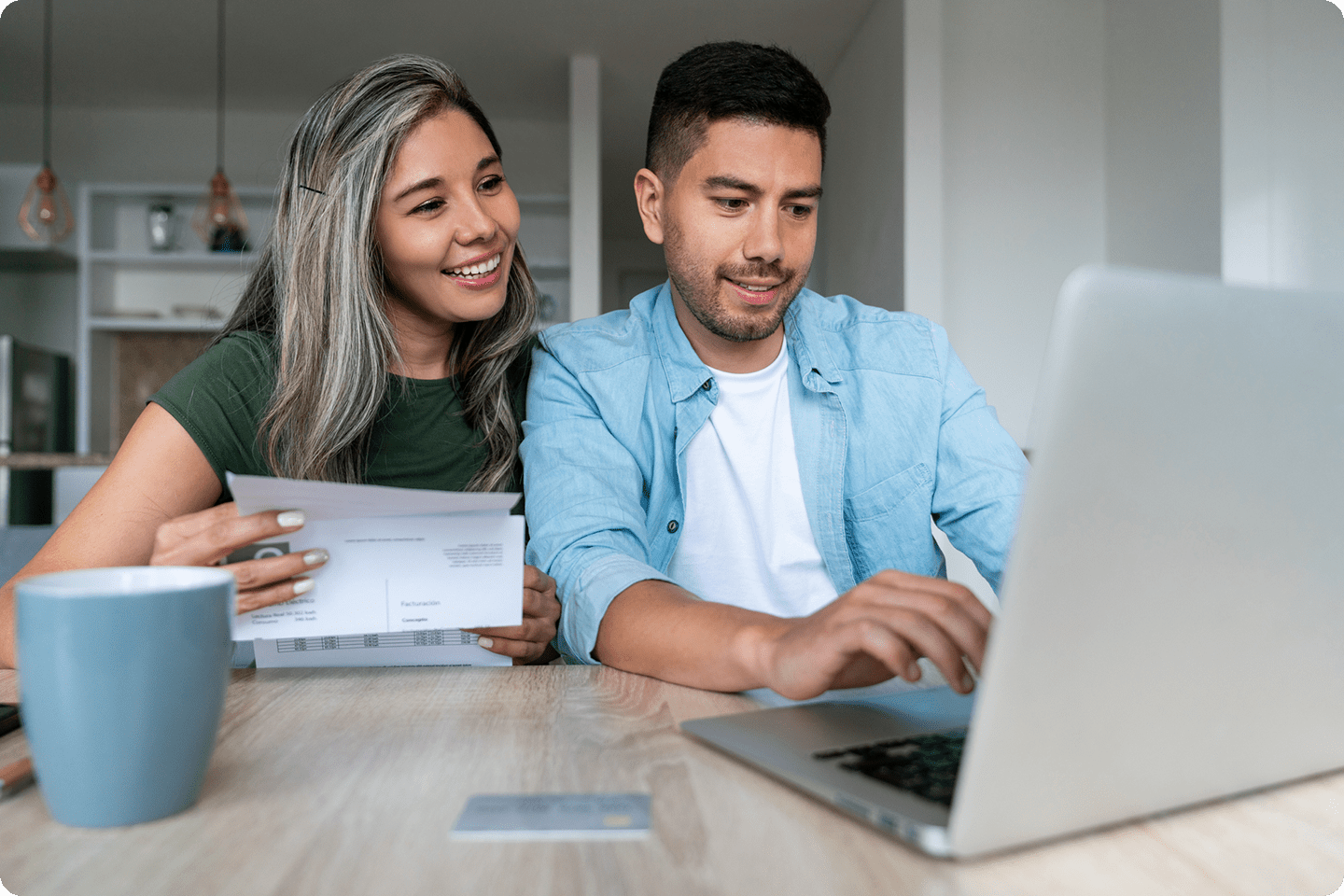 Happy couple use internet tailored to them at home.