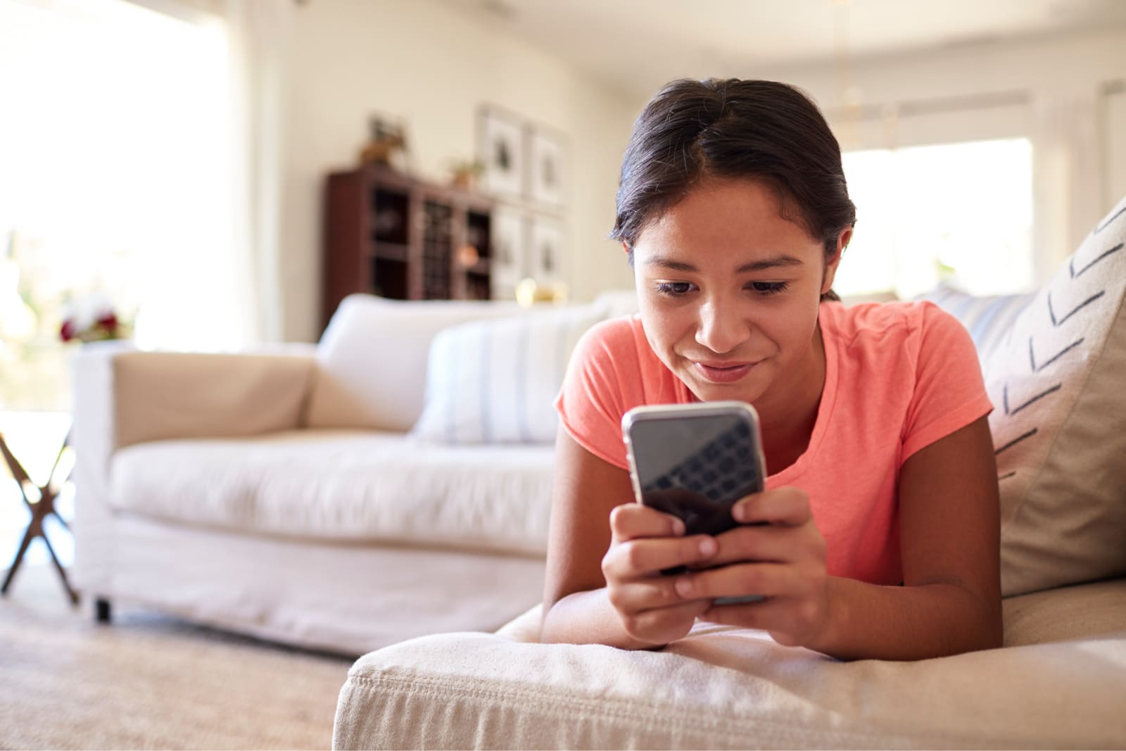 teen girl using smartphone