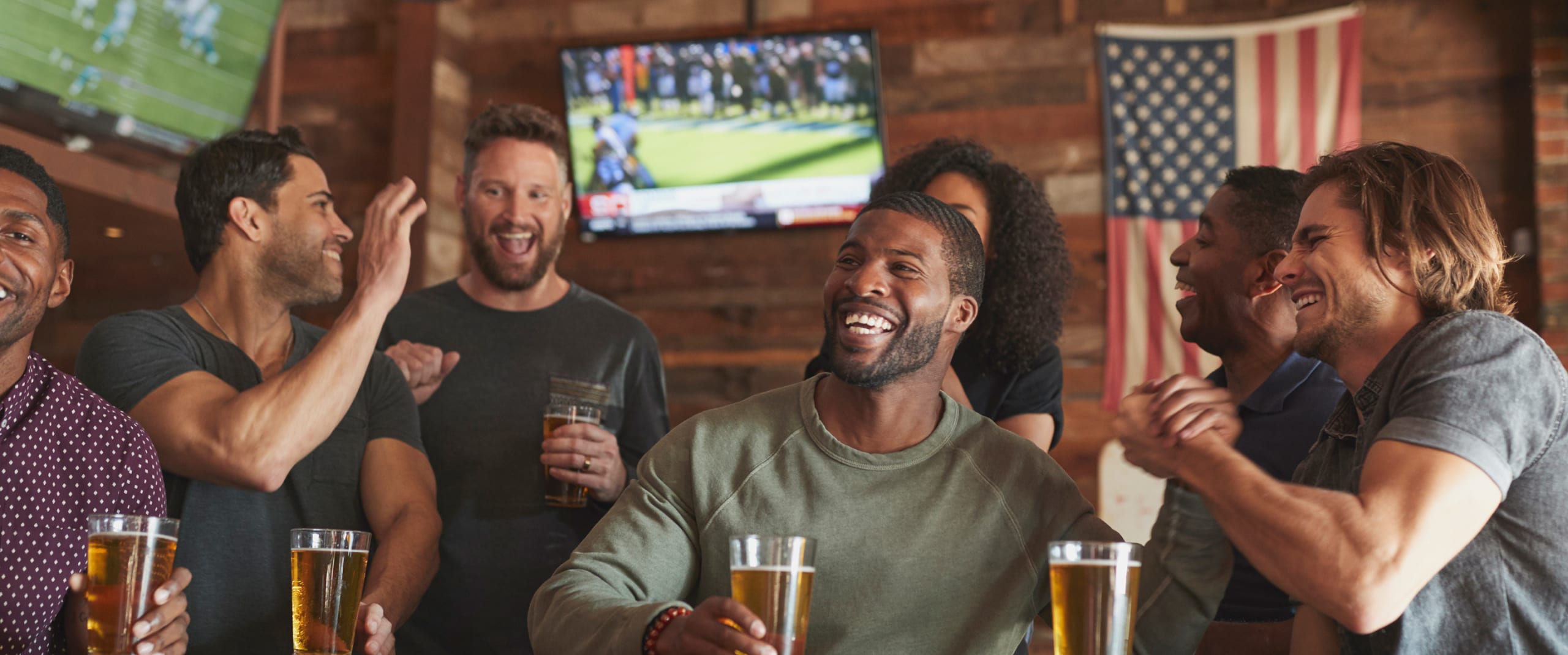 Watching football game at a bar