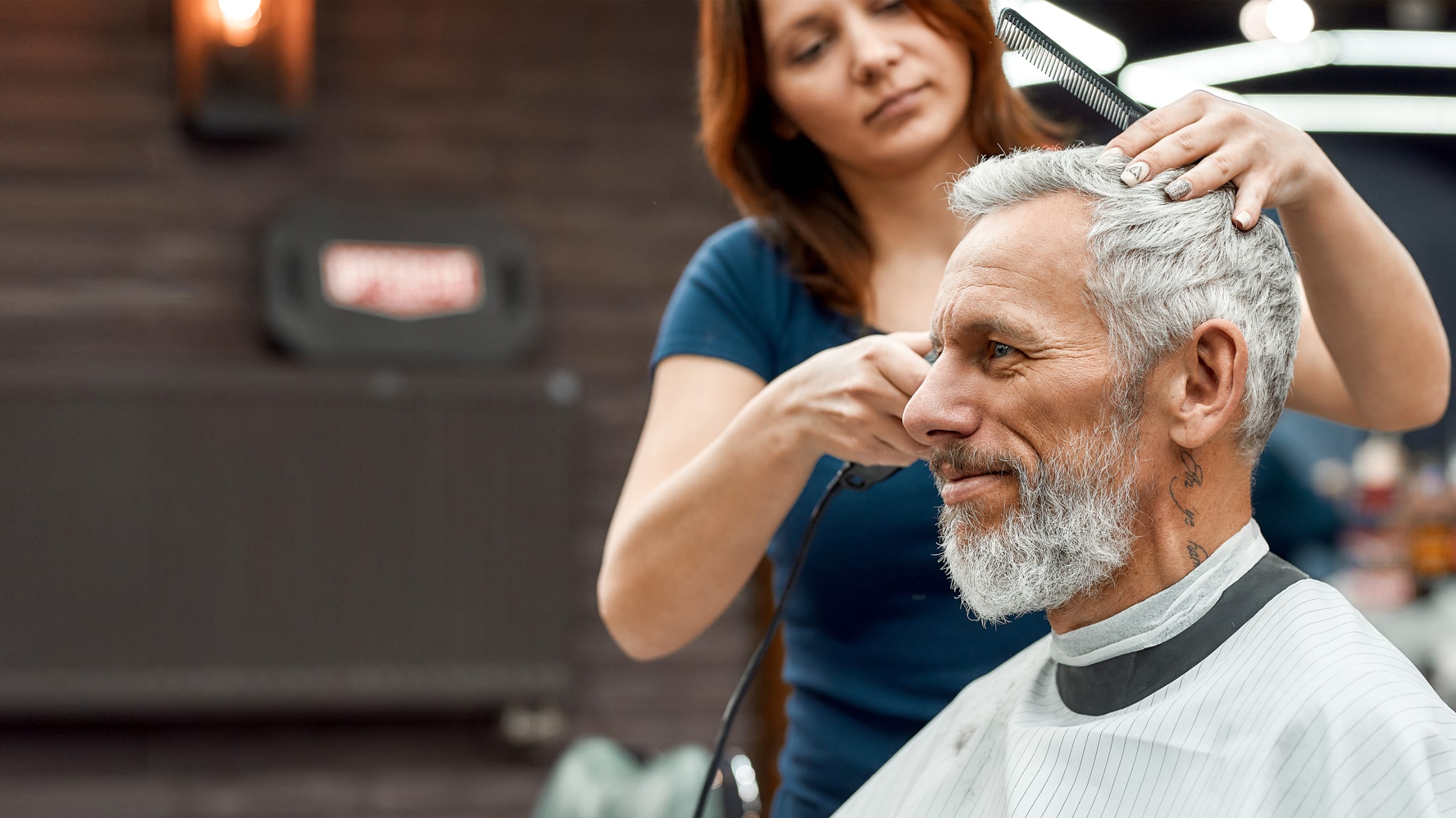 Man at the barber getting a haircut