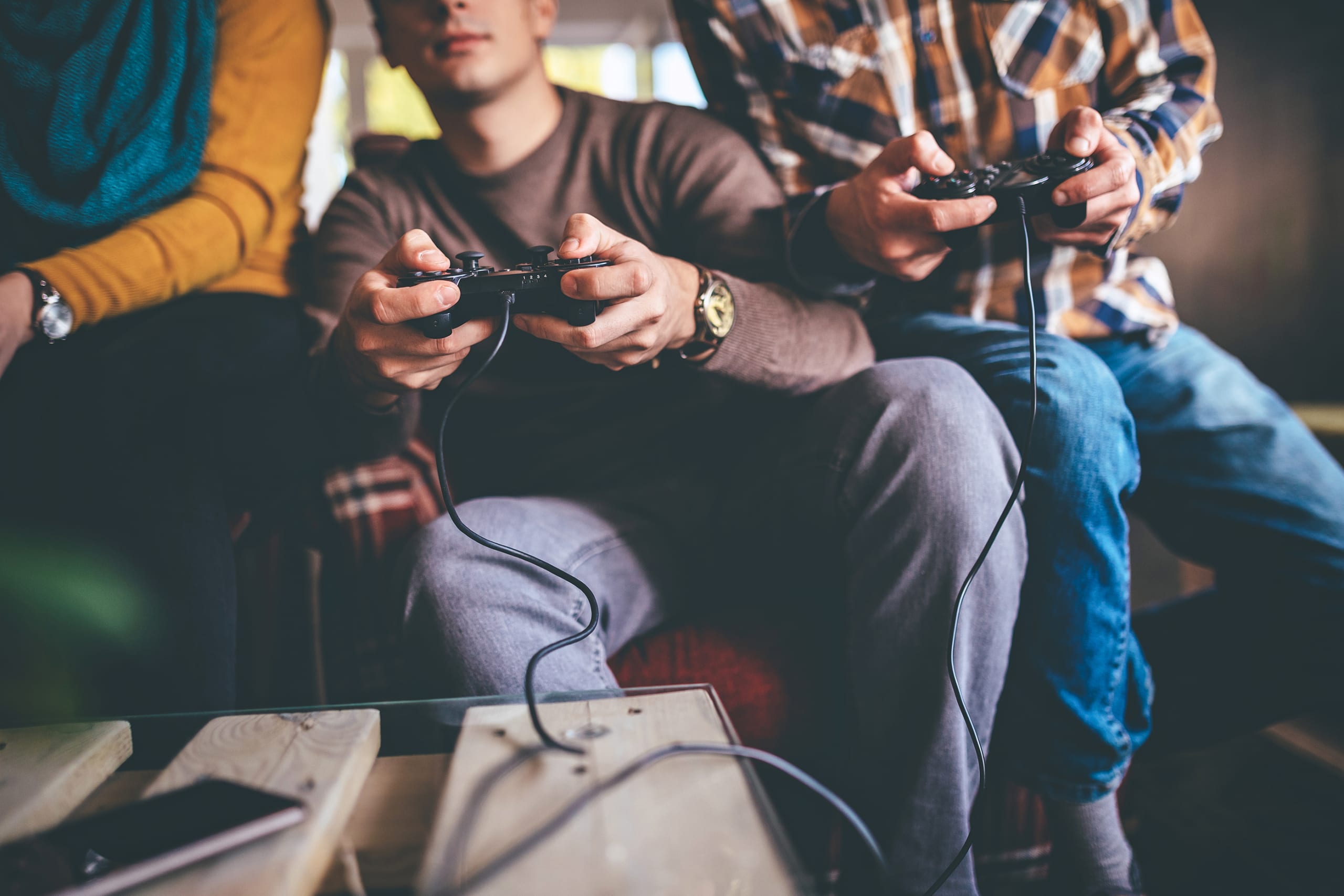 3 men playing video games