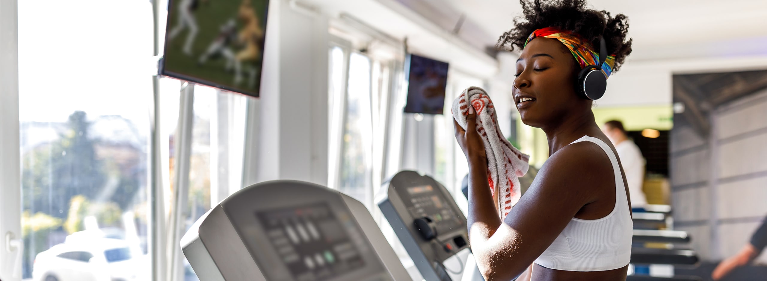 woman on treadmill at the gym