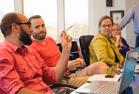 employees at conference table