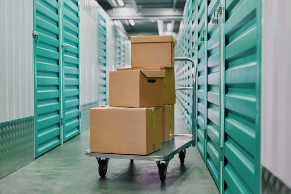 Storage Unit with a cart holding boxes to be stored