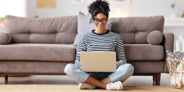 woman in glasses cruising the internet