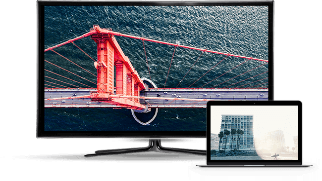 tv and laptop with image of bridge