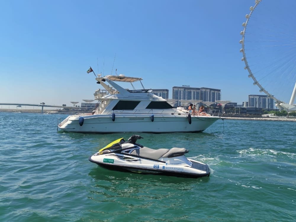 Relax and Cruise on a 4-Hour Dubai Yacht Tour up to 20 Guest best offer with Optional BBQ & Jet Ski