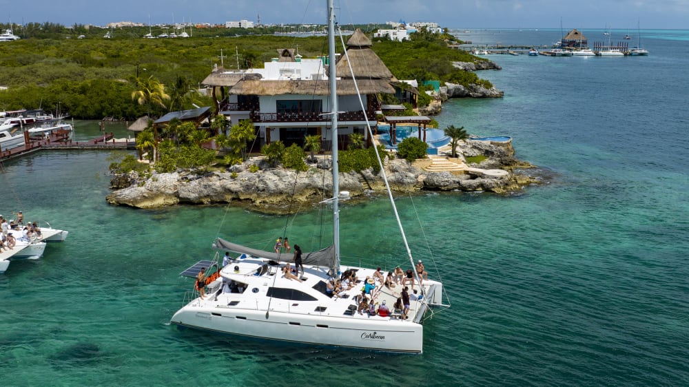 Sail, Snorkel, & Celebrate: Private Isla Mujeres Catamaran Adventure