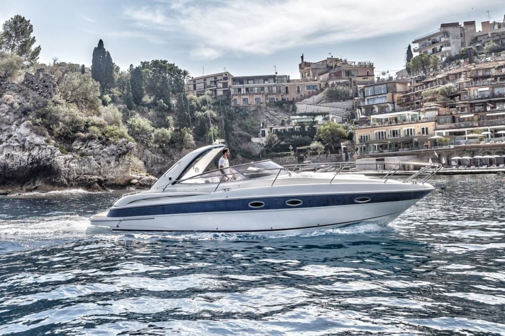 Tour in barca di un giorno intero a Giardini Naxos: esplora il paradiso costiero di Taormina