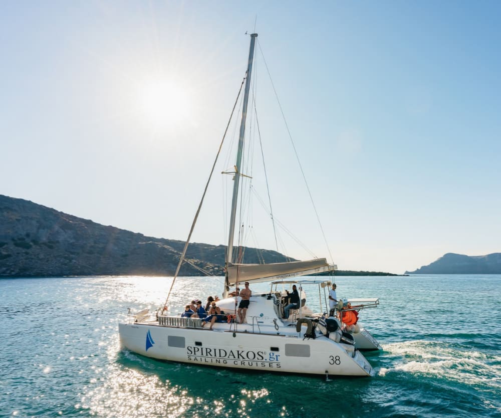 Catamaran Semi-Private Daytime Luxury Cruise with BBQ, Open Bar & Transfers
