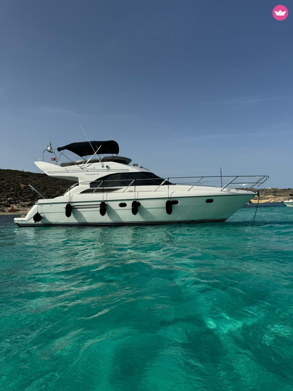 Embark on an exceptional day in the crystal clear waters of Malta on our Princess 40 Fly