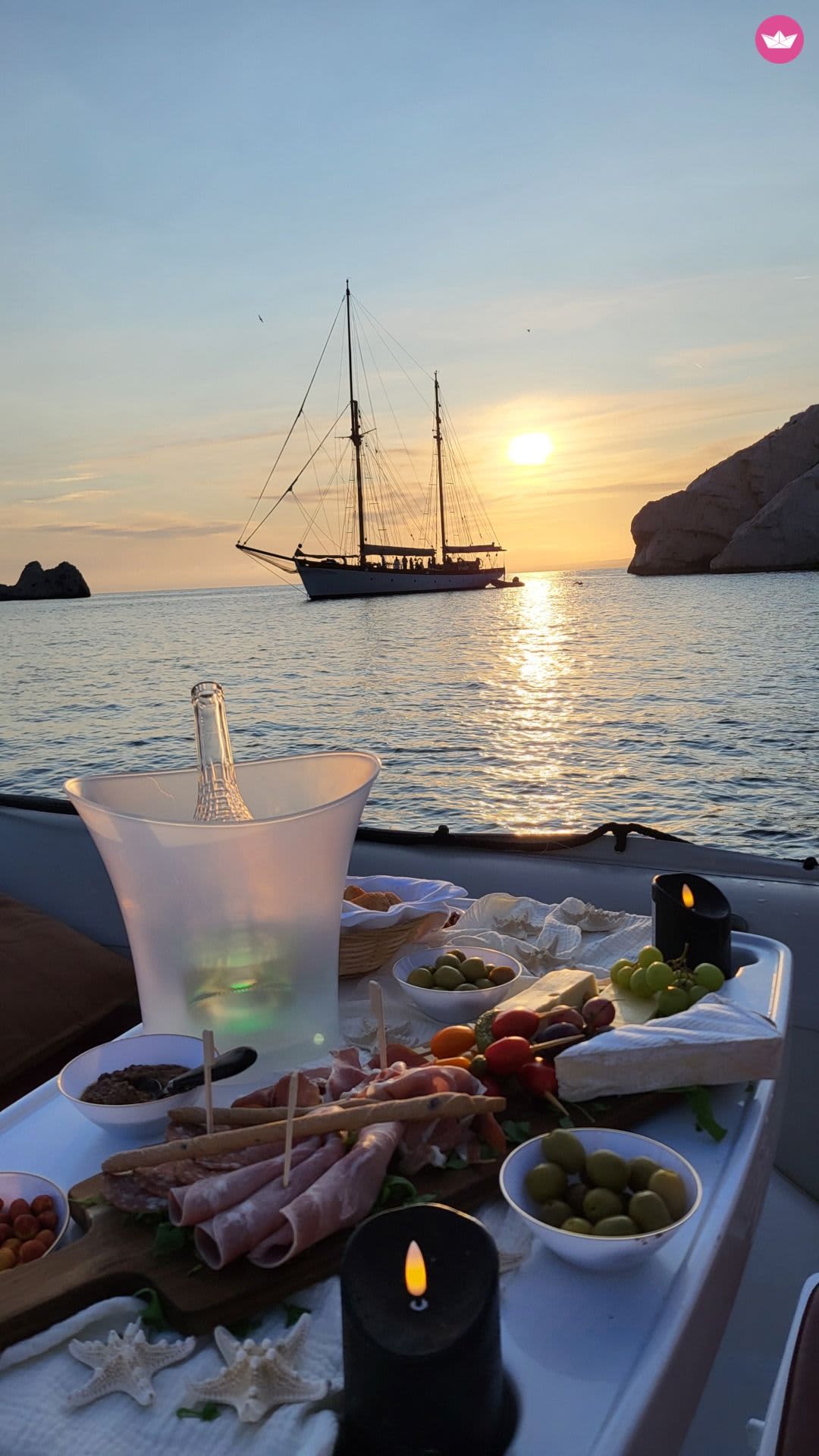 Sunset at sea: Marseille between golden lights and the cove of the Frioul Islands