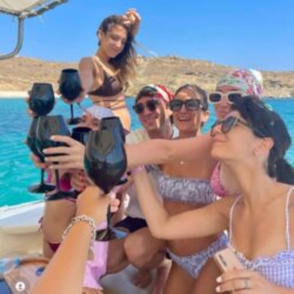 Celebrate with a Private Boat Party in Mykonos – Aboard a Traditional Wooden Boat