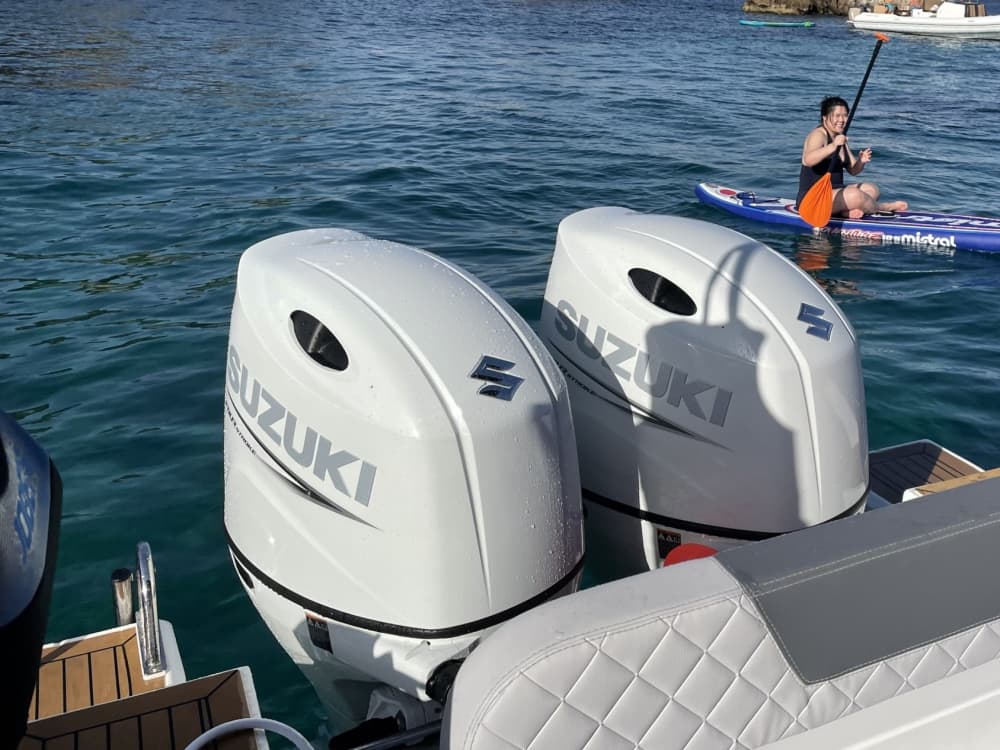 Explore Portals Nous by boat: A full day on the water aboard a motorboat