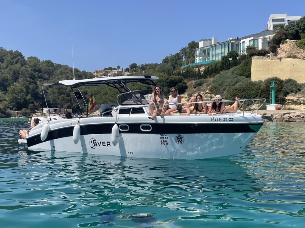 Explore Portals Nous by boat: A full day on the water aboard a motorboat