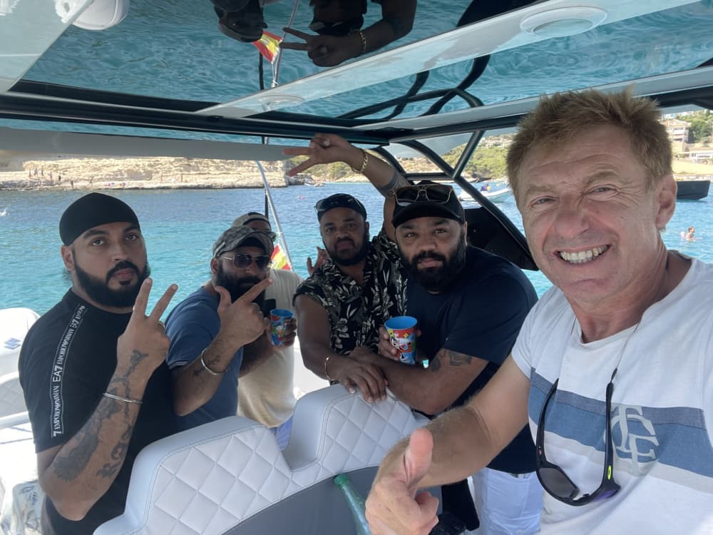Explore Portals Nous by boat: A full day on the water aboard a motorboat