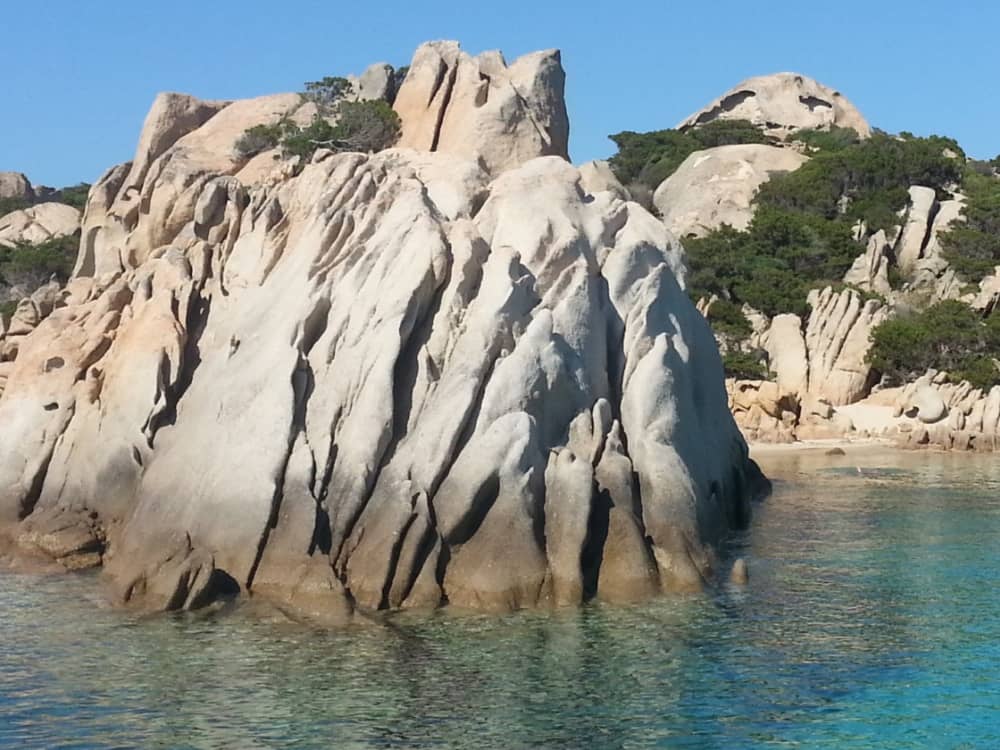 Discover La Maddalena's shores: A complete day trip aboard a motorboat