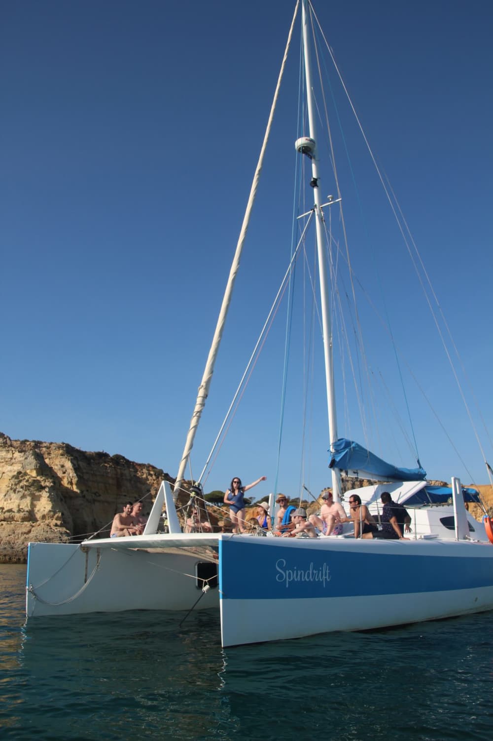 Discover Algarve coast as the sun sets on a catamaran