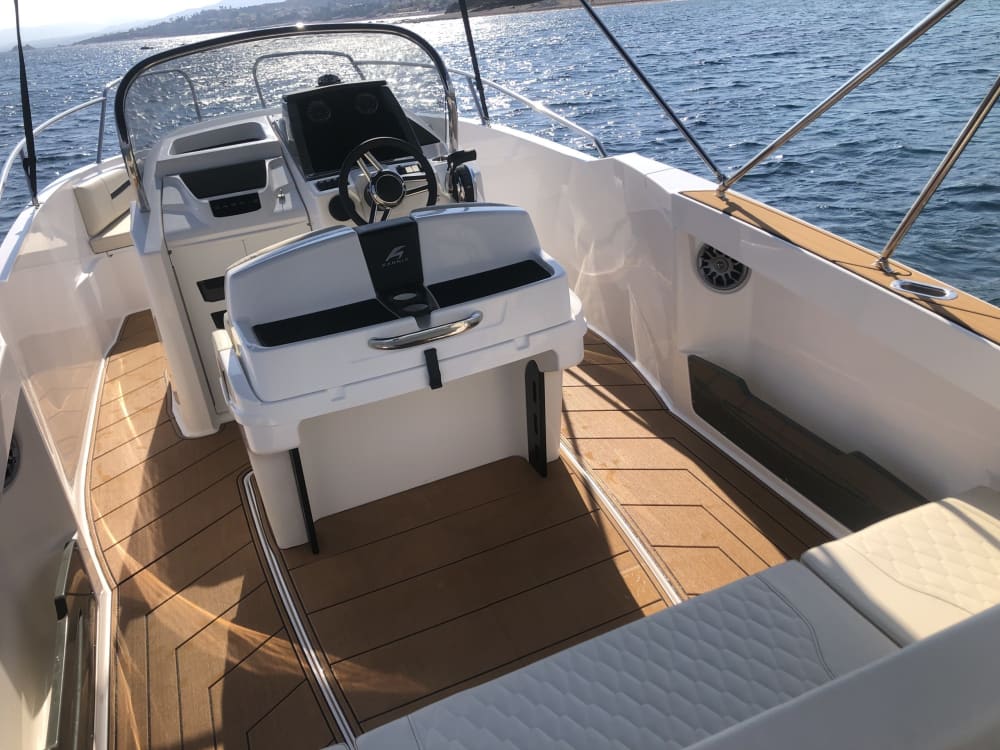 Discover Kiotari's shores: A complete day trip aboard a motorboat