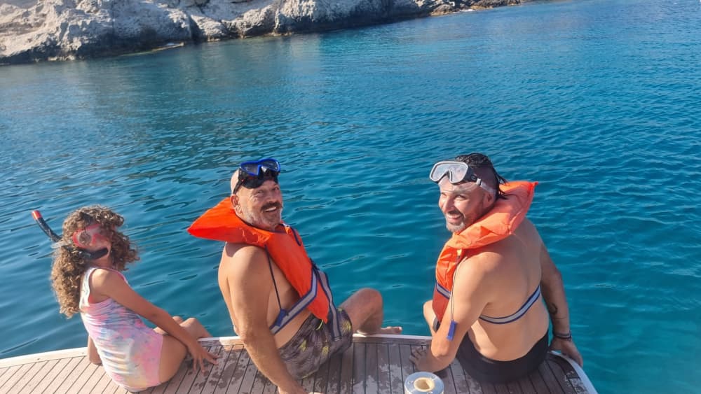 Descoberta da Ilha Symi: Cruzeiro de dia inteiro com baías escondidas e sabores locais