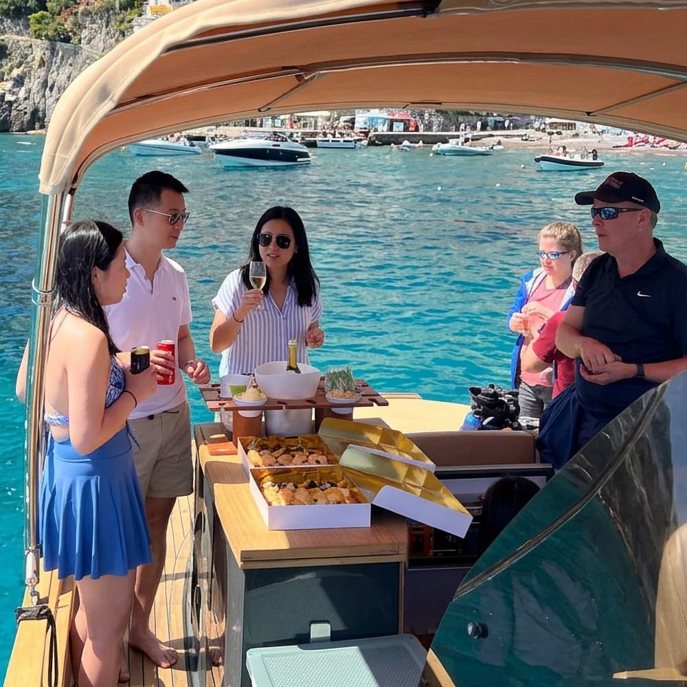 All Inclusive Full Day Capri Boat Tour from Sorrento with Disembarking to visit the Piazzetta