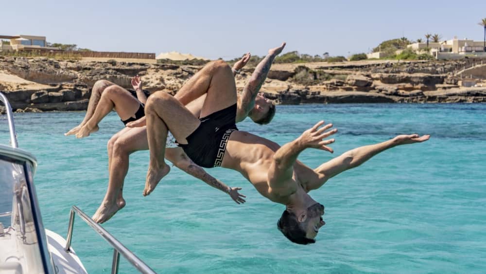 Discover Ibiza on a full-day trip on a motorboat