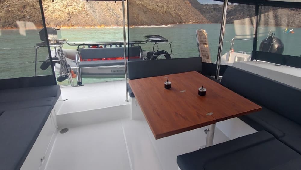 Full-Day Catamaran Cruise in Santorini – Explore, Swim & Dine aboard Lagoon 450F