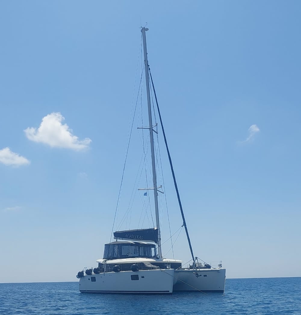 Full-Day Catamaran Cruise in Santorini – Explore, Swim & Dine aboard Lagoon 450F