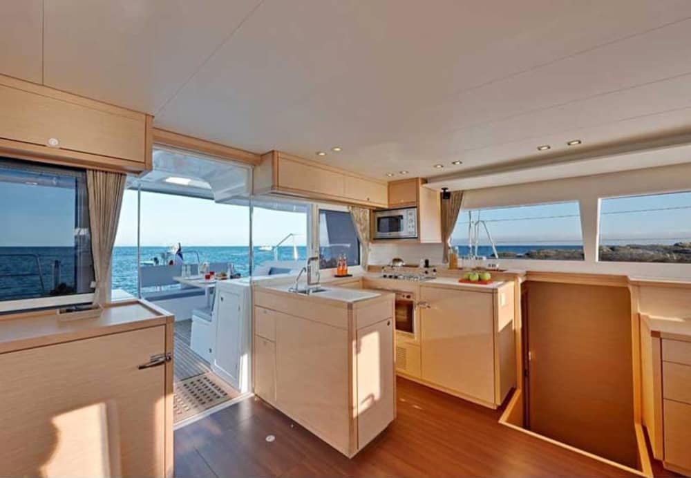 Full-Day Catamaran Cruise in Santorini – Explore, Swim & Dine aboard Lagoon 450F