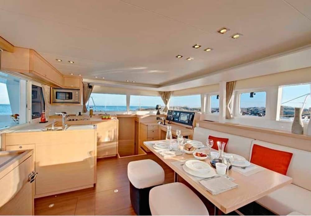 Full-Day Catamaran Cruise in Santorini – Explore, Swim & Dine aboard Lagoon 450F