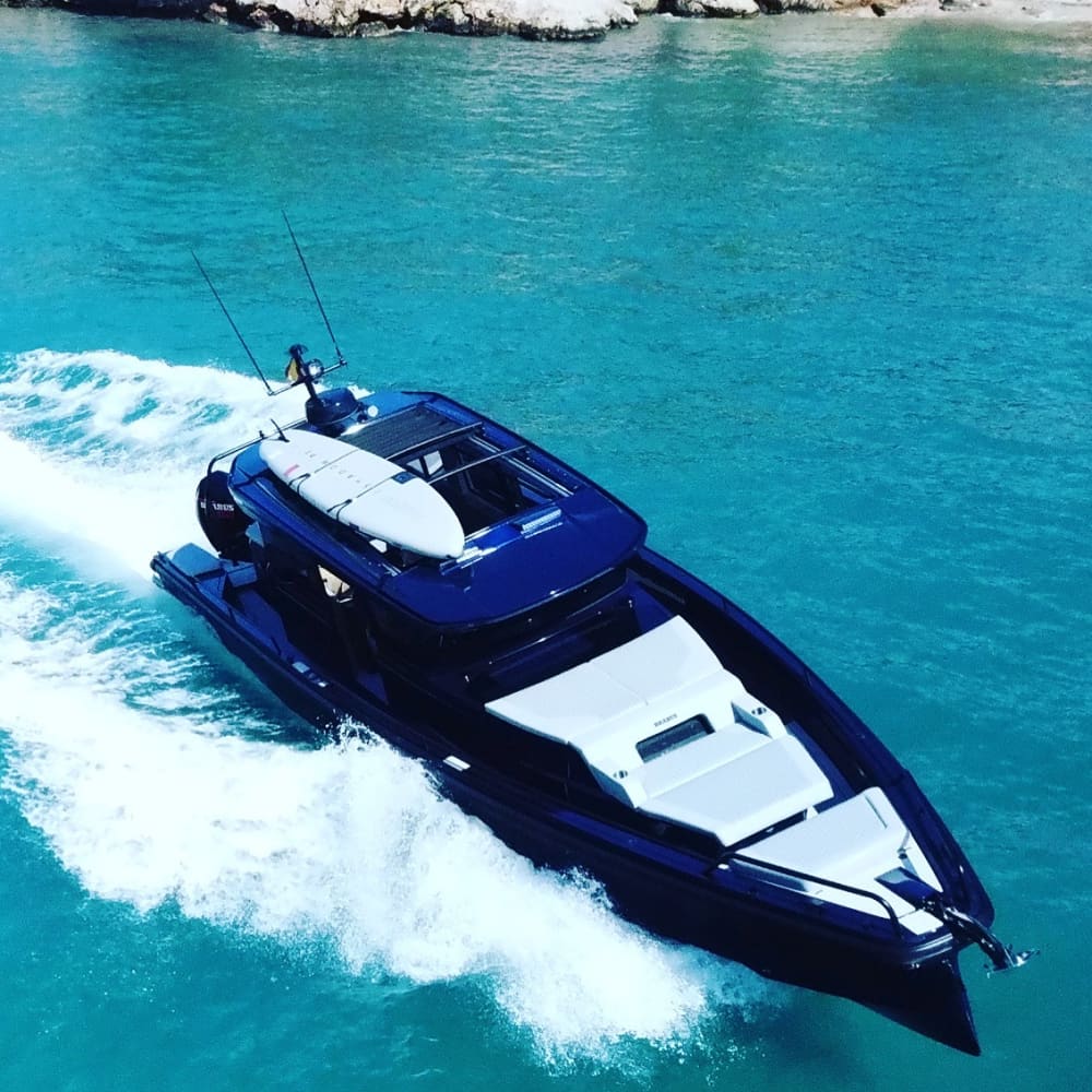 Discover Ibiza on a full-day trip on a motorboat