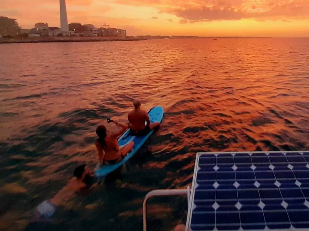 Catamaran tour with SUP