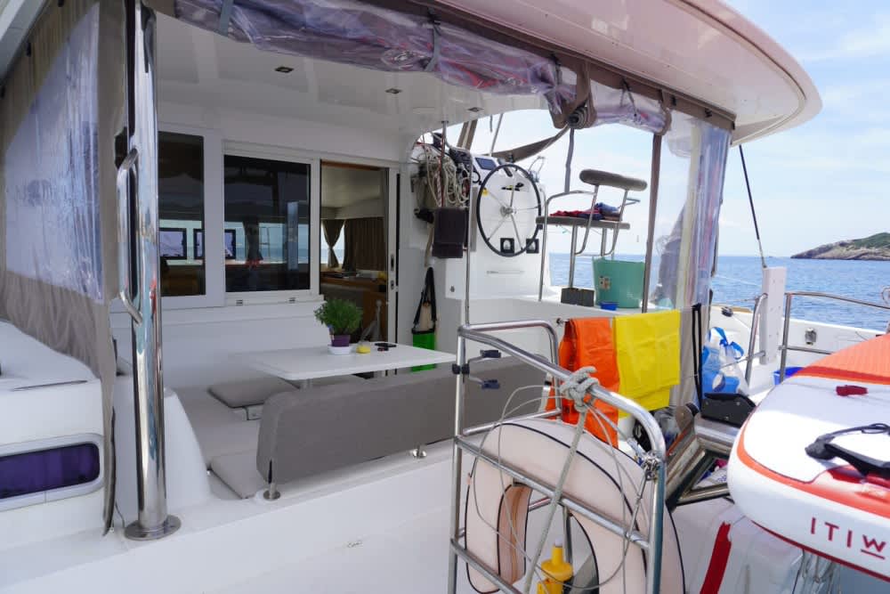 Spend a 8h sailing around Ibiza on a catamaran