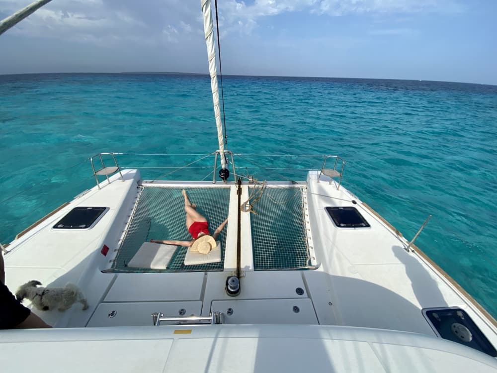 Spend a 8h sailing around Ibiza on a catamaran