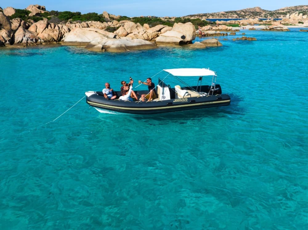 Discover the Maddalena Archipelago: rent a dinghy with a skipper for a full day exploring the magical coves of northeastern Sardinia.