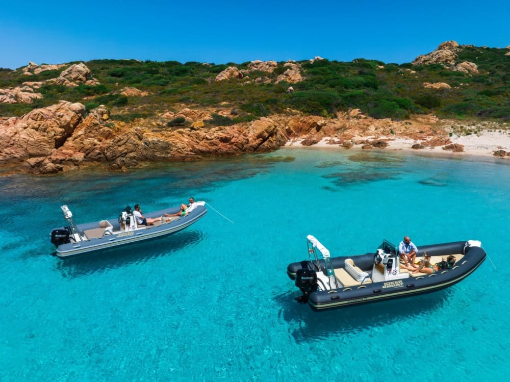 Discover the Maddalena Archipelago: rent a dinghy with a skipper for a full day exploring the magical coves of northeastern Sardinia.