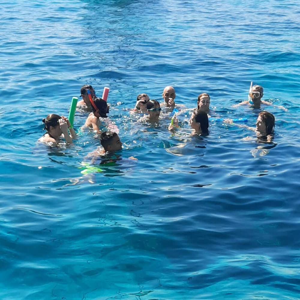 Relaxing Sunset Swim & Sailing Experience