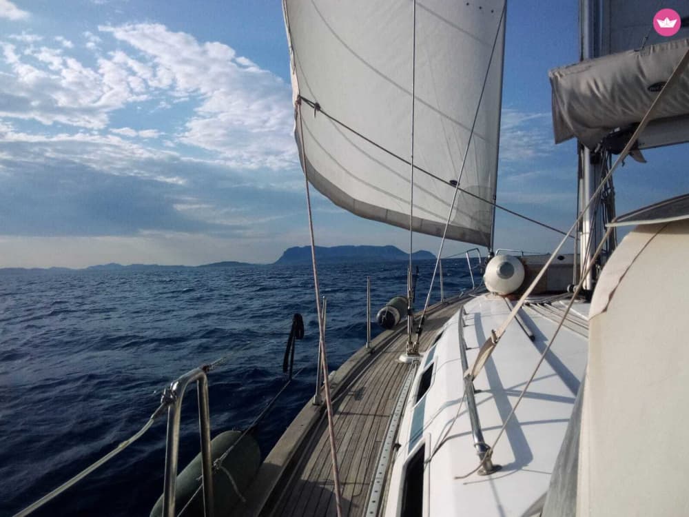 Half-day cruise in the Gulf of Cagliari: sail towards the horizon with Prosecco swimming stops.