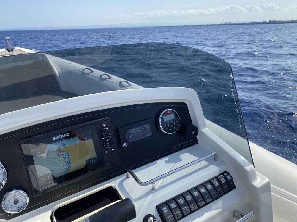 Discover Brucoli: A full day of sun on a motorboat