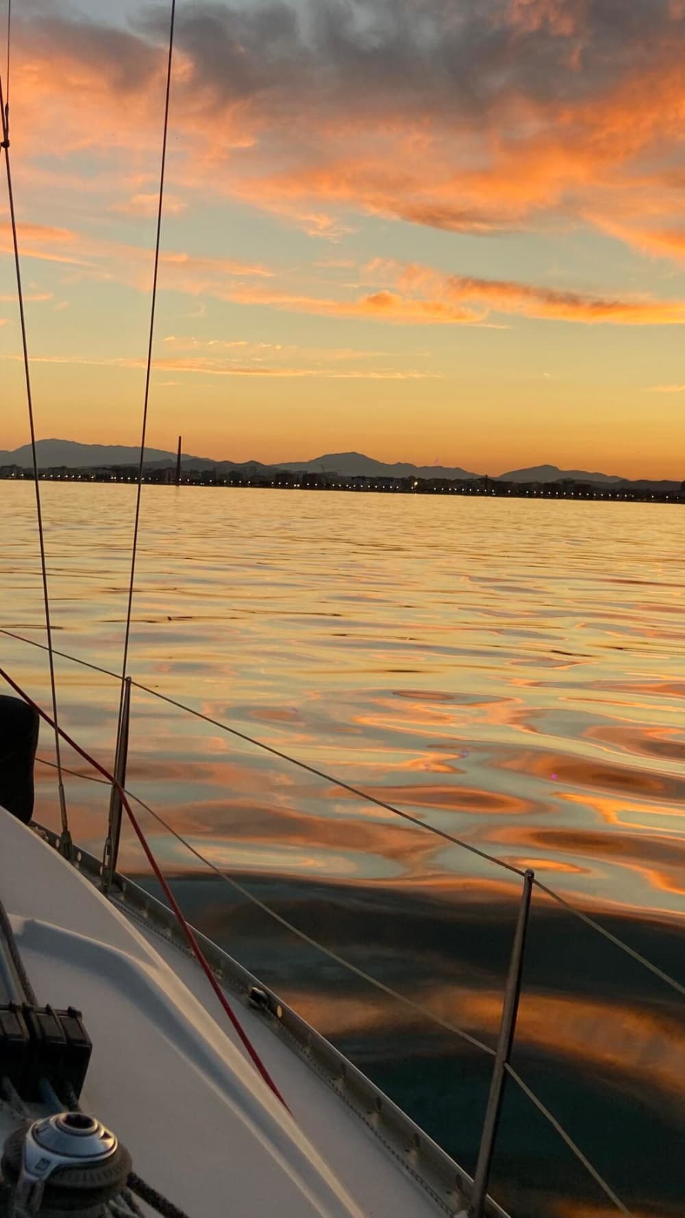 Spend 8 hours sailing around Malaga on a sailboat.