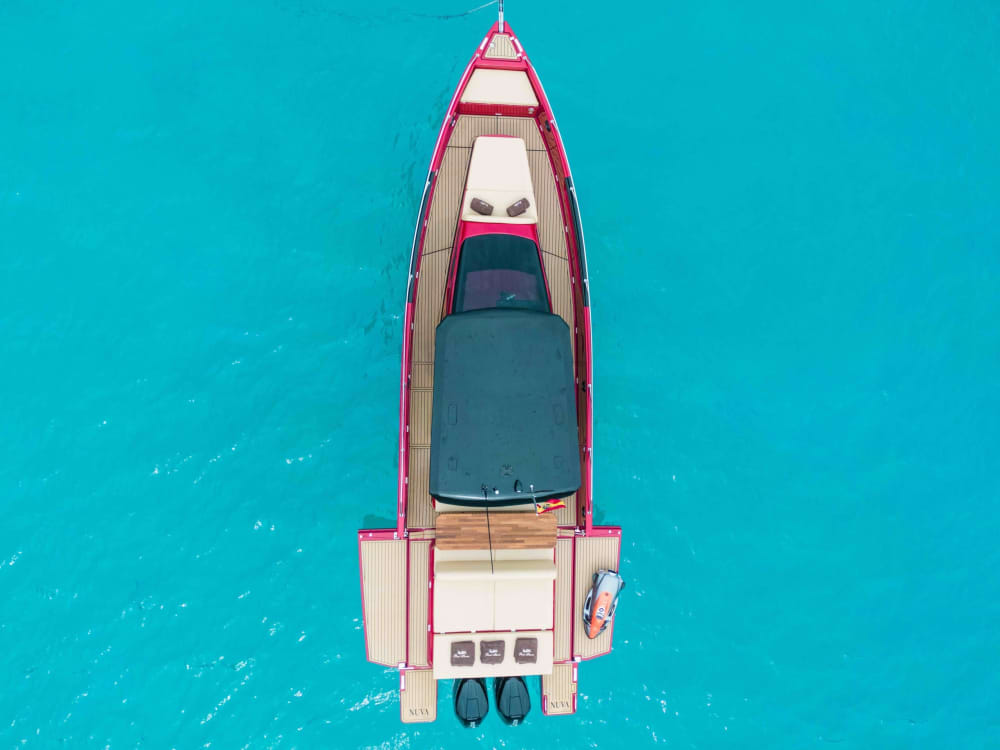 Discover Santa Eulalia del Río on a full-day trip on a motorboat