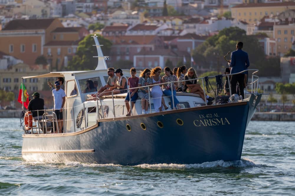 Sail through History: Explore Lisbon's Iconic Waterfront with Snacks and Wine