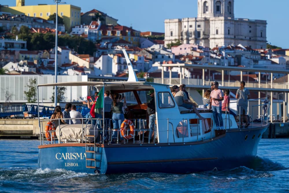 Sail through History: Explore Lisbon's Iconic Waterfront with Snacks and Wine