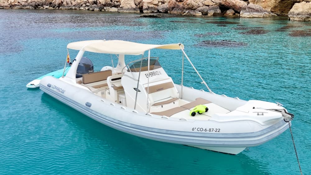 Discover Santa Eulalia del Río on a full-day trip on a motorboat