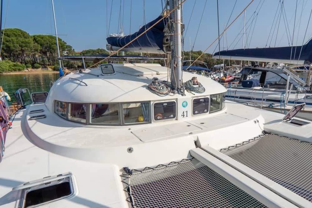 Full Day Catamaran from Cannigione: Nature, Sea and Wonder