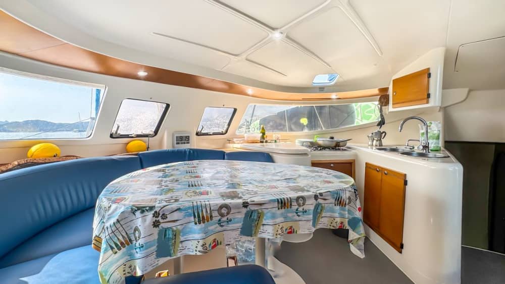 Full Day Catamaran from Cannigione: Nature, Sea and Wonder