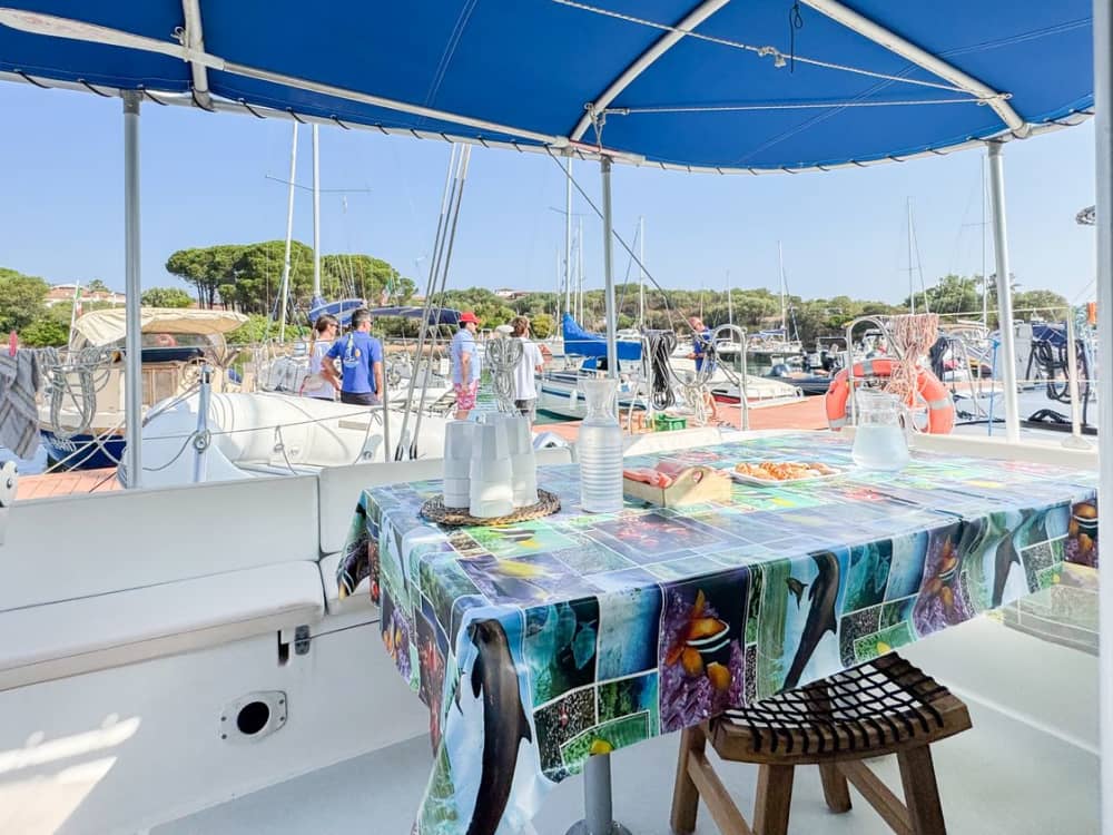 Full Day Catamaran from Cannigione: Nature, Sea and Wonder